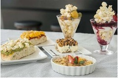 高級ポップコーン初のカフェ、ポップピザやポップコーンパフェなども。