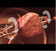 &ldquo;塊肉&rdquo;を回転しながら炙り焼く家庭用オーブン