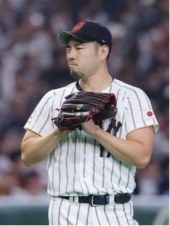 厳しい表情の菊池　野球