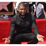 アッシャー、性病うつした女性に1億円支払い