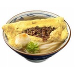 うどんにだし巻き玉子がドンッ、中には甘辛い牛しぐれ煮がたっぷり。